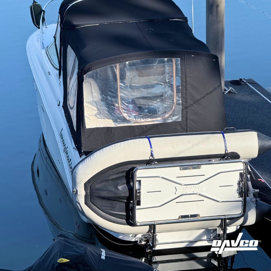 The Aquatenderdeck tender lift system holding a tender securely on a boat underway with zero bounce